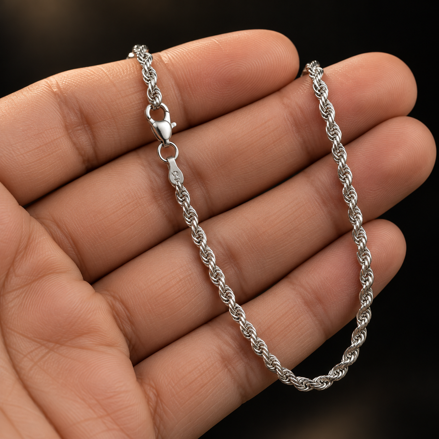 2.5mm Rhodium-Plated Sterling Silver Rope Chain held in hand
