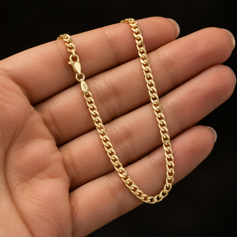 2.8mm Gold-Plated Sterling Silver Curb Chain held in hand
